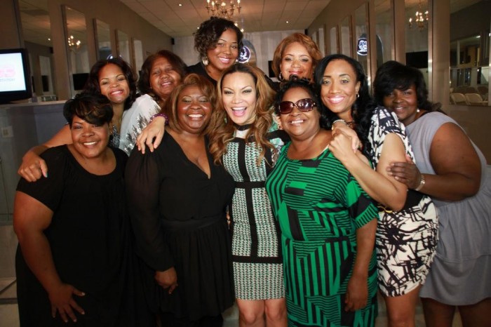 Egypt-Sherrod-poses-with-ten-lovely-moms-at-the-4th-Annual-Egypt-Mommy-Makeovers-in-Atlanta