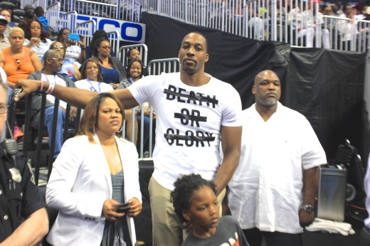 Dwight Howard and his crew...Is that one of his sons? He's a cutie